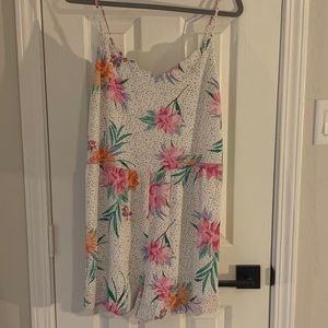 Floral white romper with scalloped nickline